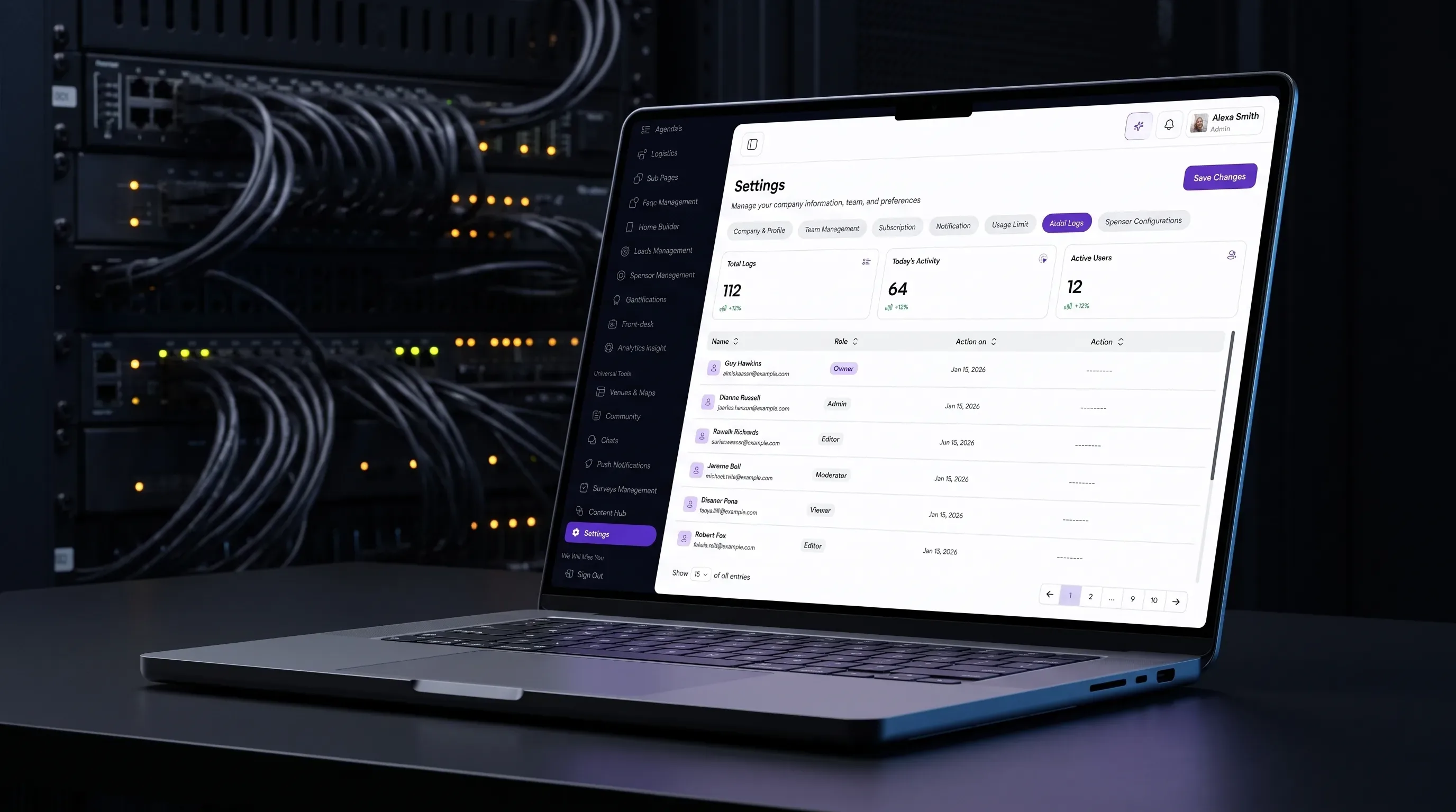 A laptop showing audit log activity in the eBrainGo admin dashboard