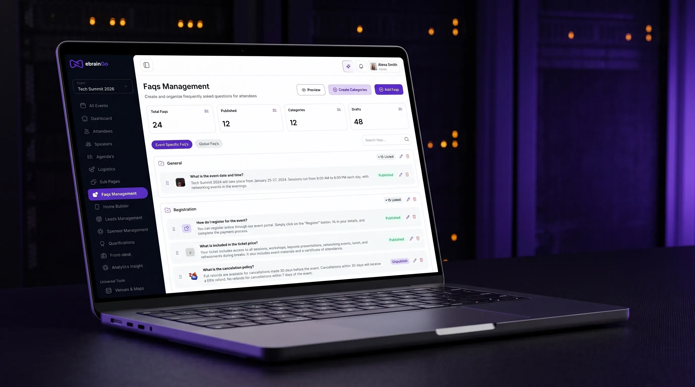 A laptop showing the searchable FAQ hub in the eBrainGo admin dashboard