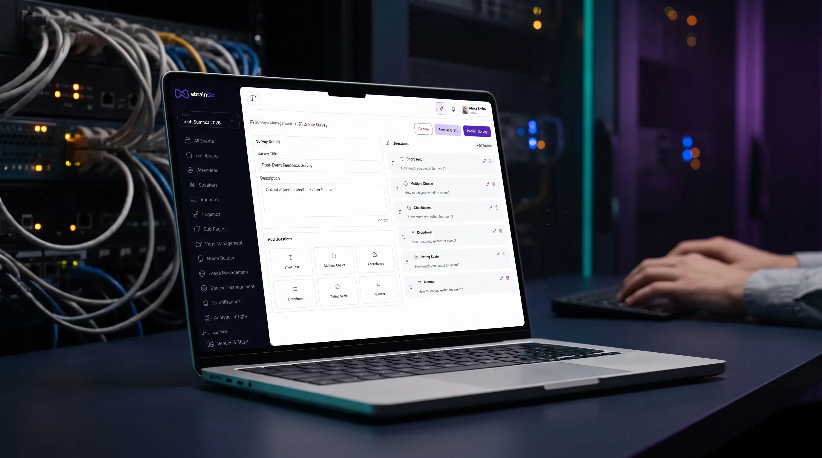 A laptop showing event survey results in the eBrainGo admin dashboard